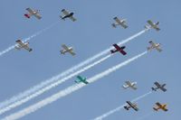  @ Lakeland Linder Regional Airport - RV flyover at Sun N Fun 2011.  Unfortunately, not all of these aircraft survived the tornado or storm that ravaged the field the next day. - by Bob Simmermon