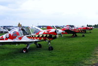  - Bulldogs of Power Aerobatics Ltd	lined up at Kemble - by Chris Hall