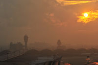  - Hazy sunset as often in HK - luckily landings were on the opposite direction that day... - by A Marignier
