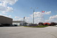  @ Atlantic Municipal Airport - The parking lot and terminal - by Glenn E. Chatfield