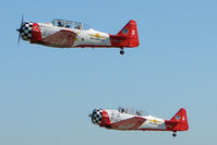  - 2 AT-6s displaying at 2011 Sun n Fun at Lakeland , Florida - by Terry Fletcher