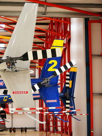 - Robinson R44's in the Heliair hangar at Denham Aerodrome - by Chris Hall
