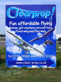  - sign in the carpark for the Clear-prop Microlight School - by Chris Hall