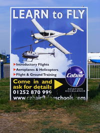  - sign in the carpark for the Cabair flying school - by Chris Hall