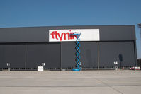  - Fly Niki titles on the hangar 3 being applied - by Dietmar Schreiber - VAP