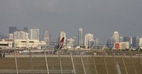  - Looking down Runway 12 towards Downtown Miami - by Florida Metal