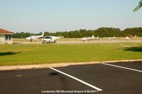  - Airport ramp - by J.G. Handelman