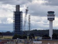  - Old and new control towers at Tullamarine. The new one is required because the old one has concrete rot caused by using inferior concrete in its construction. - by red750