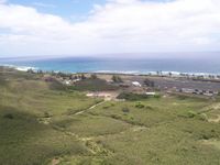  - Flying military aircraft low along side the Mt. Ridge Dillingham Airfield Hawaii. Photo is looking northeast at runway - by Paul Felix Schott