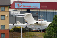  - For an aviation enthusiast thinking of stopping at Luton - this photo shows (left) the Holiday Inn Express and its proximity to the Signature Biz Jet stand - by Terry Fletcher