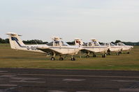  - PA-38's lined up at Cranfield - by Chris Hall