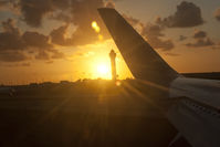  @ Miami International Airport - The sun sets at MIA (from a 767) - by Mauricio Morro