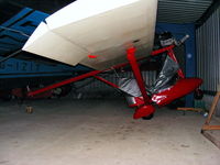 - unidentified microlight in the hangar at Baxby Manor - by Chris Hall