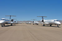  @ Kingman Airport - Numerous Continental ERJs stored at Kingman - by Terry Fletcher