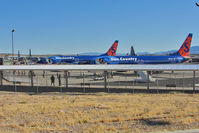  - Two Sun Country B737s and Three US Marines Hercules on the Bullhead / Laughlin apron - by Terry Fletcher