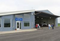  - The terminal building and hangar at Wadena Municipal Airport in Wadena, MN. Photo taken during the 2011 Wings Over Wadena Fly-in. - by Kreg Anderson