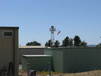  - Rotating Beacon and Wind Sock. Beacon-clear/green, location: N. Note: IZA has no ATCT. - by Doug Robertson