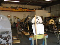  - Joe Krybus's Bucker Shop-Jungmeister fuselages in build - by Doug Robertson