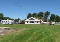  @ Starbuck Municipal Airport - The terminal building at Starbuck Municipal Airport complete with a Cessna Skyhawk and weekend campers. - by Kreg Anderson
