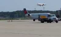  - Embraer 135 Landing, CL 600 at the gate. - by Mlands87