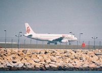  - A 320 of Dragon Air accelerating for take-off - by Micha Lueck