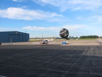  @ Union County Airport - All kinds of activity on a nice summer evening. - by Bob Simmermon
