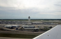  - The two new terminals are visible as we take off from runway 21L. - by Daniel L. Berek