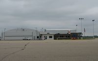  - A view of the FBO and terminal building from the ramp at Owatonna Degner Regional Airport in Owatonna, MN. - by Kreg Anderson