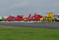  - A line up of Bond and NHL helicopters. - by Graham Reeve