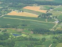  - E-W farm strip about 2 miles NW of Churubusco, IN on US 33. - by Bob Simmermon