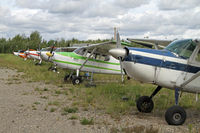  - This field has about 30 aircraft, a small museum with two Beech 18's, and Santa just down the road at North Pole!  - by Duncan Kirk