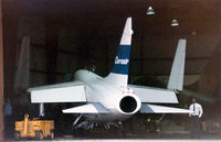  - A-7 CorsairII in a hanger at Meacham Field ....notice an second in camoflague paint inside the hanger - by Zane Adams