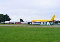  - Germania B737 D-ADIH, Air France A320 F-GHQH,  Lockheed Jetstar  N25AG, KD Avia B737 VP-BJX and DHL A300 EI-OZA in the scrapping area at Kemble - by Chris Hall