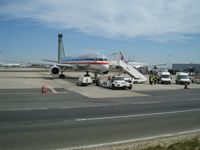  - AA normaly docks at opposite located Terminal 2A, but sometimes, lack of gates dictactes a temporary transfer on Sierra remote ramps at Terminal 1  - by Alain Durand