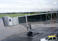  - airbridge at gate 22 at Belfast International Airport - by Chris Hall