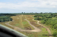  @ Quoin Hill Airport - On short finals. Airfield now largely disused - by Peter Lewis