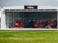  - Microflite Helicopters hanger containing 5 Eurocopters - by red750