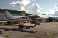 @ Notodden Airport, Tuven, - Overview of the platform and hangars with Cessna U206E floatplane LN-LMQ. - by Henk van Capelle