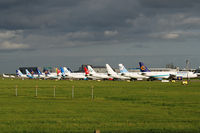  @ Dublin International Airport - Part of the line-up of charter flights that brought Portuguese supporters to Dublin for the EUFA cup final. - by Noel Kearney