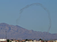  - Smoke trails left from aircraft practicing for Aviation Nation 2006. Seen from about 10 miles away. - by Brad Campbell