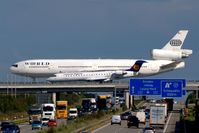 - Two airplanes on both eastern motorway bridges in a race for the quickest take-off. The small one won at least. - by Holger Zengler