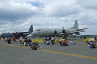  @ Misawa Air Base / Misawa Airport - P-3C Orion from Kadena AB Japan on display at Misawa AB airshow along side a Yokota AB C-130 - by Eagar