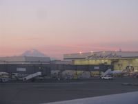  - The Alaska Airlines hangar at 6:30 AM at KSEA. - by Kreg Anderson