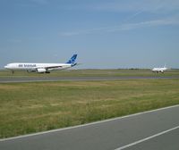  - Life as it goes on Bravo Loop when runway 09R is in use for the taking-offs. - by Alain Durand