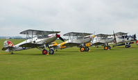  - PART OF THE FLIGHTLINE AT THE 75TH ANNIVERSARY OF THE SPITFIRE AIRSHOW. - by Martin Browne