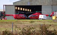  - Nose to nose. Visiting and resident Wales Air Ambulance helicopters - by Roger Winser