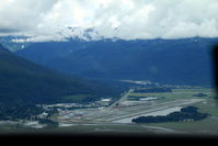  - joining for downwind Juneau Alaska in Ce208 N332AK showing parallel hard and not so hard runways - by Pete Hughes
