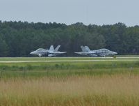  - Some F-18's about to takeoff. One in some interesting paint on one. - by Mlands87