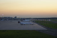  - EDDL / DUS seen from the visitors platform at the railway-station of the airport at dusk - by Andre´Gendorf