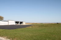  @ Waukon Municipal Airport - The hangars and runway - by Glenn E. Chatfield